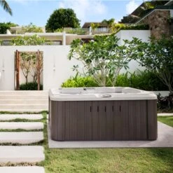 Jacuzzi® J215™ - 2-3 Person Hot Tub With 1 Lounger -Swim Spa Store J215 Lifestyle