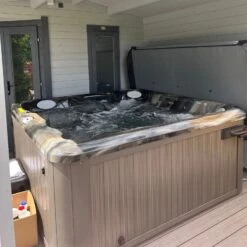 Jacuzzi® J235™ / J235IP™ - 6 Person Hot Tub With 1 Lounger -Swim Spa Store J235MIDNIGHTDRIDTWOOD CustomerRowland2Square