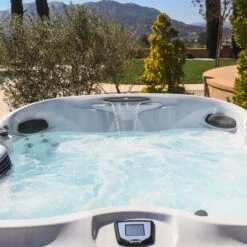 Jacuzzi® J485IP™ - 7 Person Hot Tub 36 Jacuzzi® J485IP™ - 7 Person Hot Tub -Swim Spa Store J485 Lifestyle 1