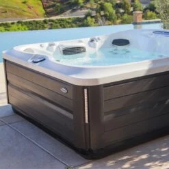 Jacuzzi® J485IP™ - 7 Person Hot Tub 37 Jacuzzi® J485IP™ - 7 Person Hot Tub -Swim Spa Store J485 Lifestyle 2