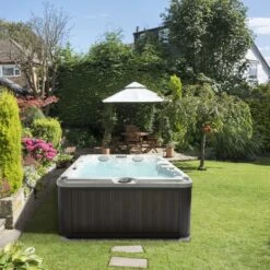 Jacuzzi® J225™ - 4 Person Hot Tub 11 Jacuzzi® J225™ - 4 Person Hot Tub -Swim Spa Store JHT J225 Lifestyle square