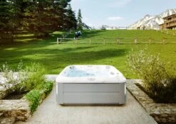 Jacuzzi® J385IP™ - 7 Person Hot Tub -Swim Spa Store JHT J385 Lifestyle BrushedGray V3 2000x1414 cd4d6490 eb8a 4cc8 93ff 7e2768be9789